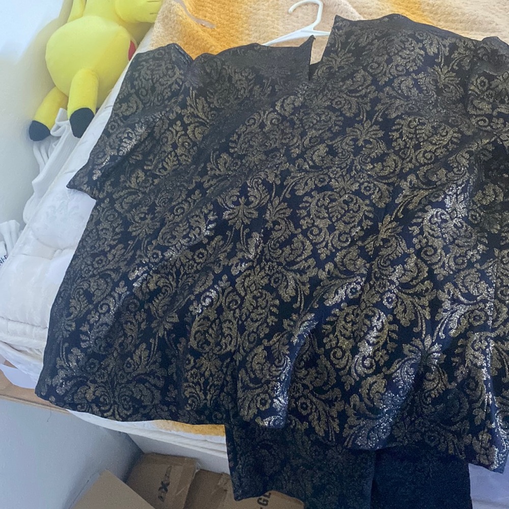 Golden and black top and pants